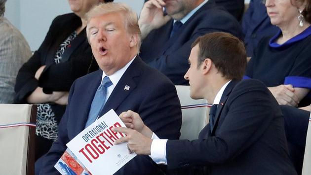 French President Emmanuel Macron and US President Donald Trump attend the Bastille Day parade on the Champs-Élysées in Paris, France. The U.S. Air Force Thunderbirds joined French Alphajets of the Patrouille de France in a bi-national fly-by over the Arc de Triomphe signifying the military cooperation of the two nations. (Yves Herman / Reuters) French President Emmanuel Macron and US President Donald Trump attend the Bastille Day parade on the Champs-Élysées in Paris, France. The U.S. Air Force Thunderbirds joined French Alphajets of the Patrouille de France in a bi-national fly-by over the Arc de Triomphe signifying the military cooperation of the two nations. (Yves Herman / Reuters)