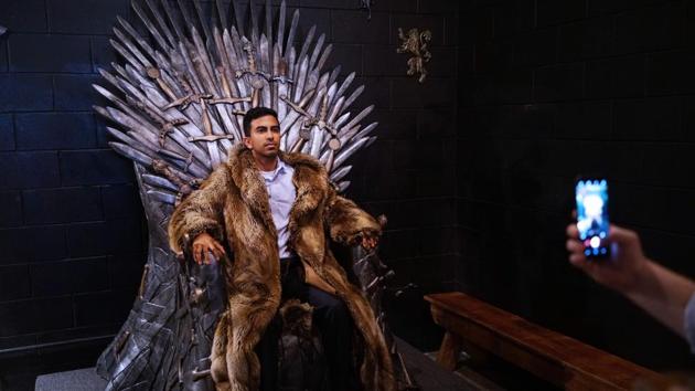 A man poses for a photo on the Iron Throne at the Game of Thrones pop-up bar in Washington DC, US. (Mandel Ngan/AFP) A man poses for a photo on the Iron Throne at the Game of Thrones pop-up bar in Washington DC, US. (Mandel Ngan/AFP)