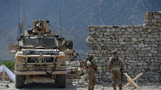US soldiers patrol near the site of a US bombing during an operation against Islamic State militants in Afghanistan in April. The US has been hitting ISIS targets in the war-torn country regularly and in April it dropped the largest non- nuclear bomb it has ever used in combat. (AFP File Photo) US soldiers patrol near the site of a US bombing during an operation against Islamic State militants in Afghanistan in April. The US has been hitting ISIS targets in the war-torn country regularly and in April it dropped the largest non- nuclear bomb it has ever used in combat. (AFP File Photo)