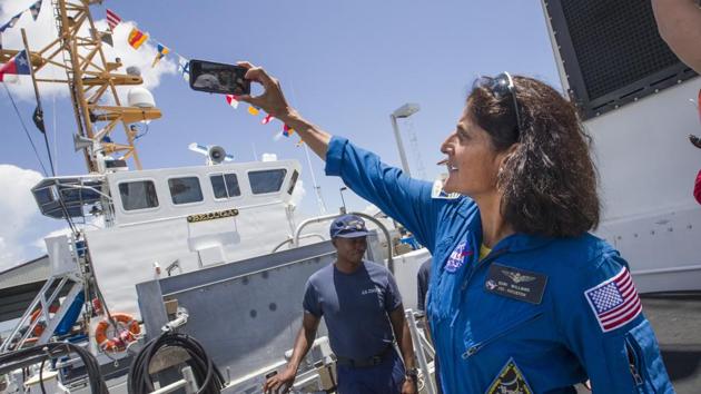 NASA astronaut Sunita Williams takes a photograph after boarding the US Coast Guard Cutter Manowar to view a training exercise using a full scale mock-up of the Orion capsule in the Gulf of Mexico off the coast of Galveston, Texas on July 13, 2017. (AP Photo) NASA astronaut Sunita Williams takes a photograph after boarding the US Coast Guard Cutter Manowar to view a training exercise using a full scale mock-up of the Orion capsule in the Gulf of Mexico off the coast of Galveston, Texas on July 13, 2017. (AP Photo)