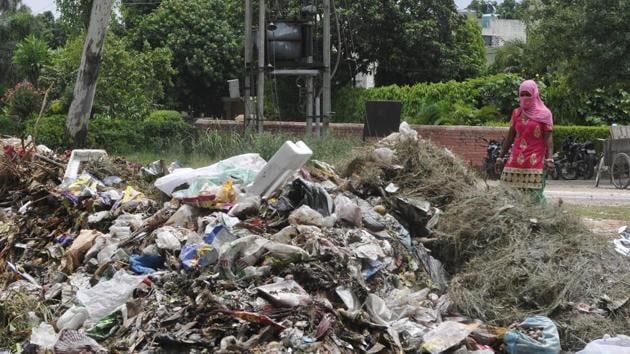 Unattended garbage outside a collection centre in Sector 21, Chandigarh, on Friday.(Karun Sharma/HT Photo)