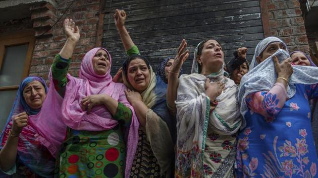 Kashmiri women wail as they watch the funeral procession of a local rebel Sajad Ahmed Gilkar in Srinagar, Indian controlled Kashmir. (Dar Yasin / AP) Kashmiri women wail as they watch the funeral procession of a local rebel Sajad Ahmed Gilkar in Srinagar, Indian controlled Kashmir. (Dar Yasin / AP)