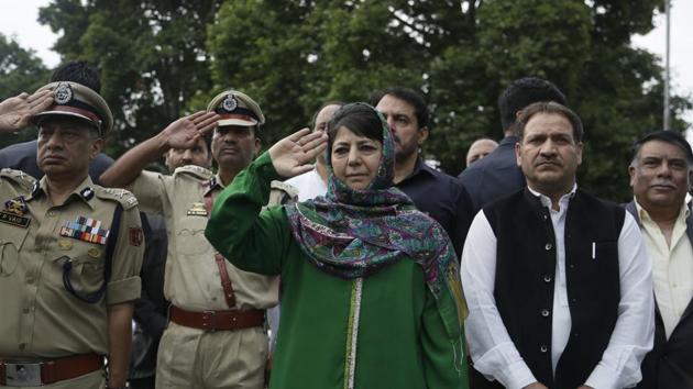 Jammu and Kashmir state Chief Minister Mehbooba Mufti pays homage at Martyr's graveyard in Srinagar. July 13 is observed as Martyrs' Day in memory of the day when the region s Hindu king ordered more than 20 Kashmiri Muslims executed in a bid to put down an uprising in 1931. (Mukhtar Khan / AP) Jammu and Kashmir state Chief Minister Mehbooba Mufti pays homage at Martyr's graveyard in Srinagar. July 13 is observed as Martyrs' Day in memory of the day when the region s Hindu king ordered more than 20 Kashmiri Muslims executed in a bid to put down an uprising in 1931. (Mukhtar Khan / AP)