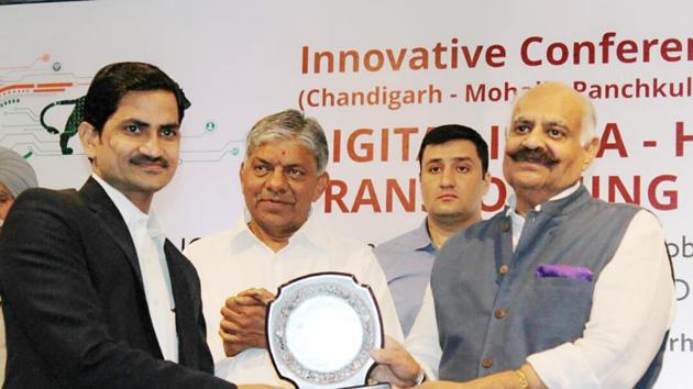 Punjab governor V P Singh felicitating Imran Khan at a Digital India event in Chandigarh last month. (HT PHOTO) Punjab governor V P Singh felicitating Imran Khan at a Digital India event in Chandigarh last month. (HT PHOTO)