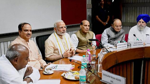 Prime Minister Narendra Modi, home minister Rajnath Singh, finance minister Arun Jaitley, Parliamentary affairs ministers Ananthkumar and SS Ahluwalia (extreme right) with former prime minister and JD(S) president HD Deve Gowda (extreme left) during an all-party meeting ahead of monsoon session, in New Delhi on Sunday.(PTI Photo)