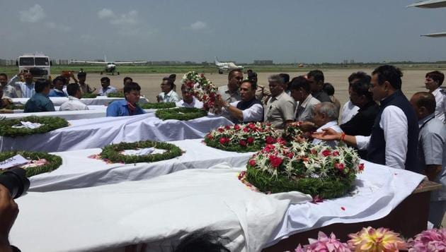 Bodies of Amarnath pilgrims who died in a terror attack in Anantnag in Jammu and Kashmir reach Surat on July 11.(HT Photo)