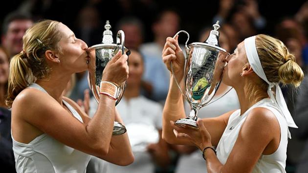 Ekaterina Makarova (L) and Elena Vesnina won their maiden Wimbledon women’s doubles title with a 6-0, 6-0 win over Taiwan’s Hao-Ching Chan and Romanian Monica Niculescu. (Getty Images) Ekaterina Makarova (L) and Elena Vesnina won their maiden Wimbledon women’s doubles title with a 6-0, 6-0 win over Taiwan’s Hao-Ching Chan and Romanian Monica Niculescu. (Getty Images)