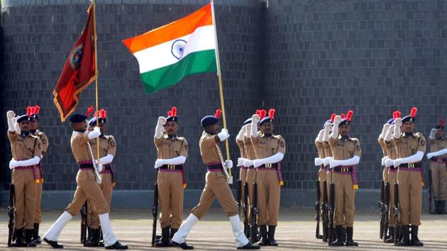 SRPF cadets holding the flag as part of the march past at the convocation in Pune. (HT PHOTO)