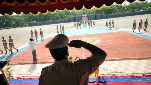 Suresh Kumar Mekala salutes the passing out SRPF cadets during the parade in Pune. (HT PHOTO)
