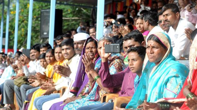 Relatives of SRPF cadets eagerly observing the proceedings during passing out parade in Pune. (HT PHOTO)