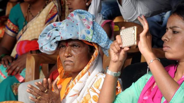 Relatives of SRPF cadets during passing out parade in Pune. (HT PHOTO)