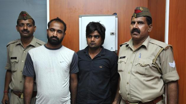Police arrested Pradeep Bhati and Amir (second and third from left) for the murder of Pradeep’s cousin Sajan Bhati in Salarpur village. (Sunil Ghosh/HT Photo) Police arrested Pradeep Bhati and Amir (second and third from left) for the murder of Pradeep’s cousin Sajan Bhati in Salarpur village. (Sunil Ghosh/HT Photo)