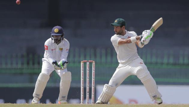Zimbabwe's Sikandar Raza plays a shot during the third day's play of the one-off Test against Sri Lanka in Colombo, Sri Lanka on Sunday. (AP) Zimbabwe's Sikandar Raza plays a shot during the third day's play of the one-off Test against Sri Lanka in Colombo, Sri Lanka on Sunday. (AP)