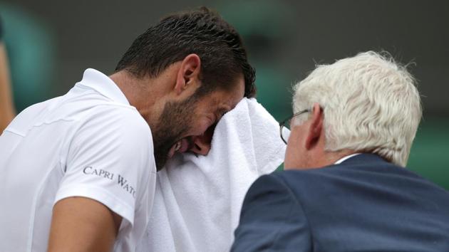 Marin Cilic was in severe pain and had his foot taped up before the third set began. (REUTERS)