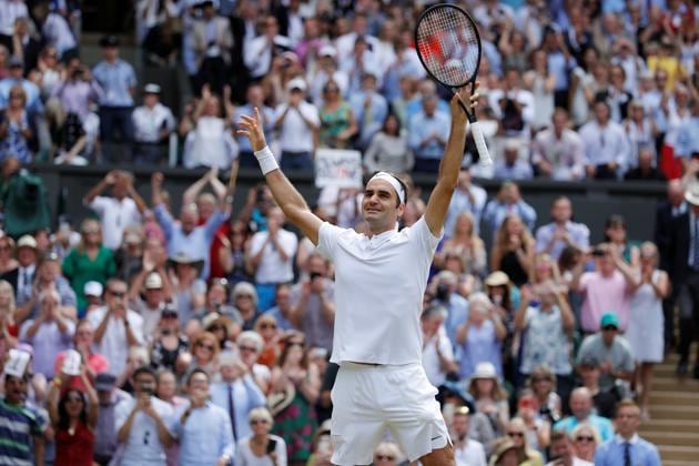 Roger Federer easily wrapped up the third set 6-4 and won his first Wimbledon title since 2012. (REUTERS)