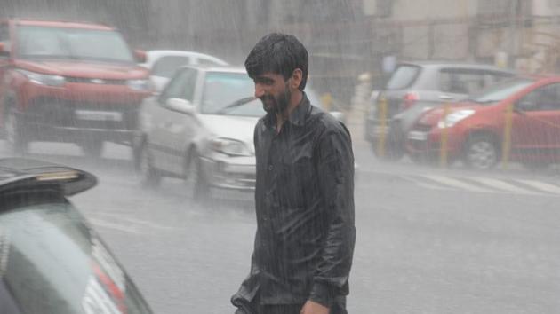 Heavy showers were witnessed in Thane on Monday morning. (PRAFUL GANGURDE) Heavy showers were witnessed in Thane on Monday morning. (PRAFUL GANGURDE)