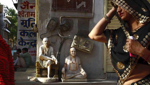 For two weeks now, the historic Moortikars or idol craftsmen of Jaipur whose profession is as old as the city itself haven’t opened their shops. While discarded statues gaze over the deserted lanes of Moorti bazaar, thousands of idols of gods and goddesses belonging to Hindu, Jain and also Buddhist faiths, carved on order by customers for various temples or homes are lying locked and shuttered. The reason – for the first time ever, the Goods and Service Tax (GST) in effect from July 01, 2017 has hiked the tax bracket on these marble idols manifold. (Himanshu Vyas / HT Photo)