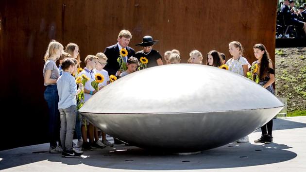 Dutch King Willem-Alexander, center left, and Queen Maxima during the revealing of the National Monument for the MH17 victims in Vijfhuizen, The Netherlands, July 17, 2017. (AP) Dutch King Willem-Alexander, center left, and Queen Maxima during the revealing of the National Monument for the MH17 victims in Vijfhuizen, The Netherlands, July 17, 2017. (AP)