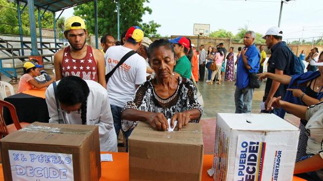 Photos: Over 7.1 Million Venezuelans Cast Symbolic Vote To Rewrite ...