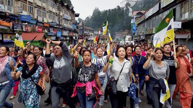Darjeeling: Nari Morcha members during their Khukri rally for the separate state of Gorkhaland, in Darjeeling on Friday. PTI Photo (PTI7_14_2017_000153B)(PTI)