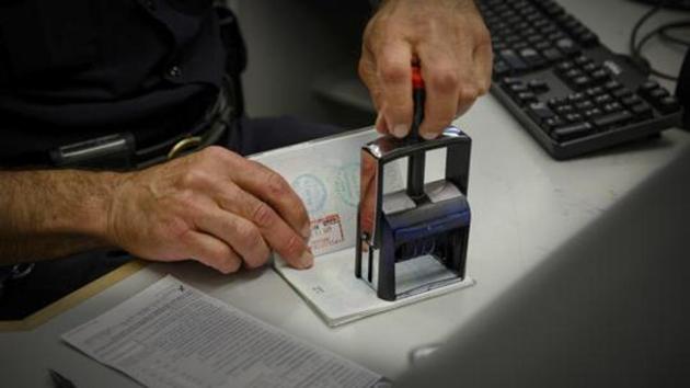 A passport is stamped at the immigration security check in Newark, N.J., May 28, 2014.(NYT File Photo)