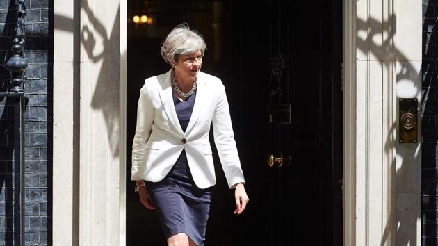 Britain's Prime Minister Theresa May exits 10 Downing Street in central London on July 18, 2017 to greet Estonia's Prime Minister. (AFP) Britain's Prime Minister Theresa May exits 10 Downing Street in central London on July 18, 2017 to greet Estonia's Prime Minister. (AFP)