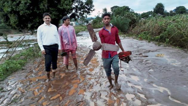 In Rayagada, four road bridges were washed away, while in Kalahandi, Hati river was flowing over the bridge connecting Junagad and Bhawanipatna. (PTI) In Rayagada, four road bridges were washed away, while in Kalahandi, Hati river was flowing over the bridge connecting Junagad and Bhawanipatna. (PTI)