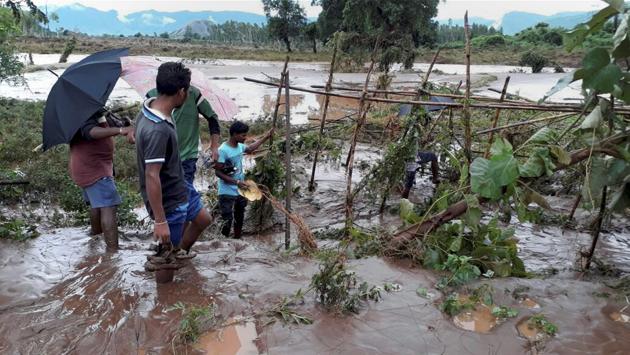 Volunteers checking the water level of river Nagabali during flash flood in Rayagada district, Odisha. Emergency medicine stock including anti-snake venom have been stored in community health centres of the district. (PTI) Volunteers checking the water level of river Nagabali during flash flood in Rayagada district, Odisha. Emergency medicine stock including anti-snake venom have been stored in community health centres of the district. (PTI)