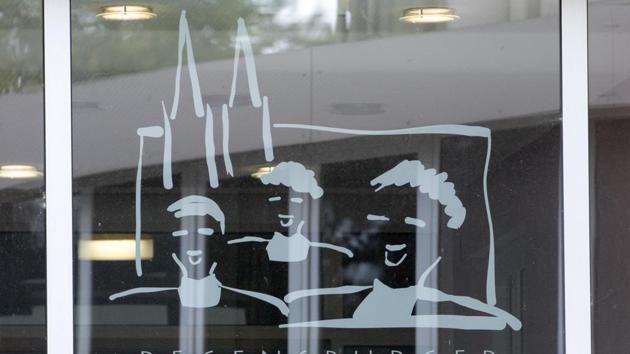 Picture taken on October 12, 2016 shows the logo of the Regensburger Domspatzen boy's choir at a building of the choir's secondary school in Regensburg, southern Germany. (AFP File) Picture taken on October 12, 2016 shows the logo of the Regensburger Domspatzen boy's choir at a building of the choir's secondary school in Regensburg, southern Germany. (AFP File)