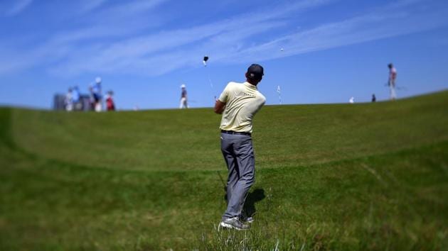 Brendan Steele chips onto the 9th green during a practice round at Royal Birkdale. (AFP) Brendan Steele chips onto the 9th green during a practice round at Royal Birkdale. (AFP)