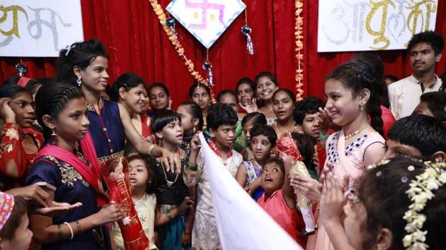 Children preparing their dolls for the wedding ceremony. (Rahul Raut/HT PHOTO) 