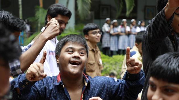 A boy engrossed in the dance ceremony. (Rahul Raut/HT PHOTO) 