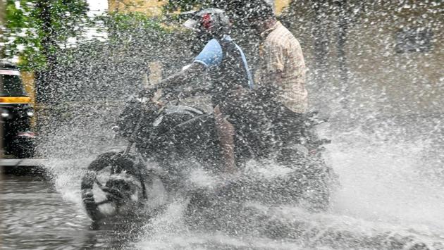 Some made a splash in the rain. (shashi kashyap/HT PHOTO) 