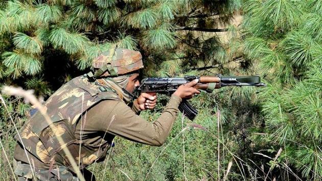 An Army soldier taking position during an encounter with militants in Keran sector of Jammu and Kashmir. (PTI Photo)