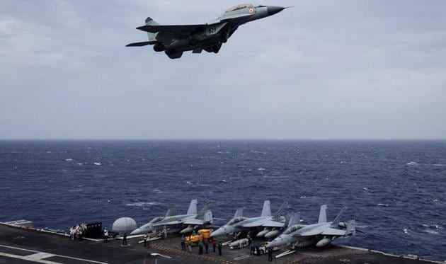 Indian Air Force's MIG-29K Fulcrum flies over US Navy ship Nimitz as part of the tri-nation Malabar 2017 exercise in Bay of Bengal near Chennai coast on Monday. (PTI) Indian Air Force's MIG-29K Fulcrum flies over US Navy ship Nimitz as part of the tri-nation Malabar 2017 exercise in Bay of Bengal near Chennai coast on Monday. (PTI)