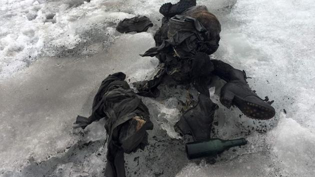 This handout picture distributed on July 18, 2017 by a Swiss cable cars company shows the mummified remains of a Swiss Couple who went missing 75 years ago and who were found in a glacier in the Diablerets mountains, in southern Switzerland. The perfectly preserved bodies lay close to each other, with their backpacks, a bottle, a book and a watch. (AFP Photo/Glacier 3000) This handout picture distributed on July 18, 2017 by a Swiss cable cars company shows the mummified remains of a Swiss Couple who went missing 75 years ago and who were found in a glacier in the Diablerets mountains, in southern Switzerland. The perfectly preserved bodies lay close to each other, with their backpacks, a bottle, a book and a watch. (AFP Photo/Glacier 3000)