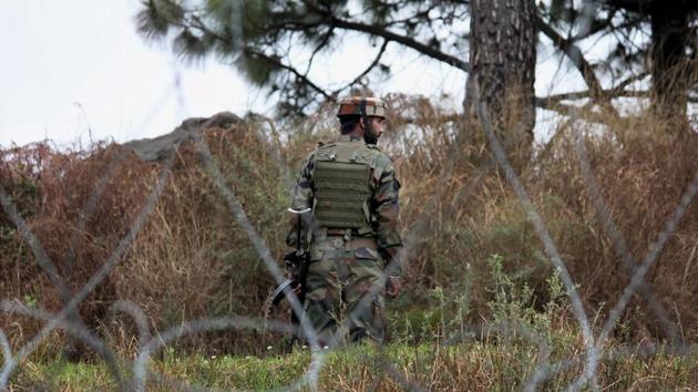 An Indian Army jawan patrolling at the Line of Control (LOC) in Poonch district of Jammu and Kashmir on Wednesday, days after ceasefire violations by the Pakistan Army in Krishna Ghati sector.(PTI)