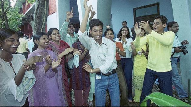 Senior students make juniors dance while ragging on the first day of college in the year 2003. After the ban on ragging across universities, interactions between freshers and their seniors have taken the form of informal intro sessions. (S Burmaula / HT Photo) Senior students make juniors dance while ragging on the first day of college in the year 2003. After the ban on ragging across universities, interactions between freshers and their seniors have taken the form of informal intro sessions. (S Burmaula / HT Photo)