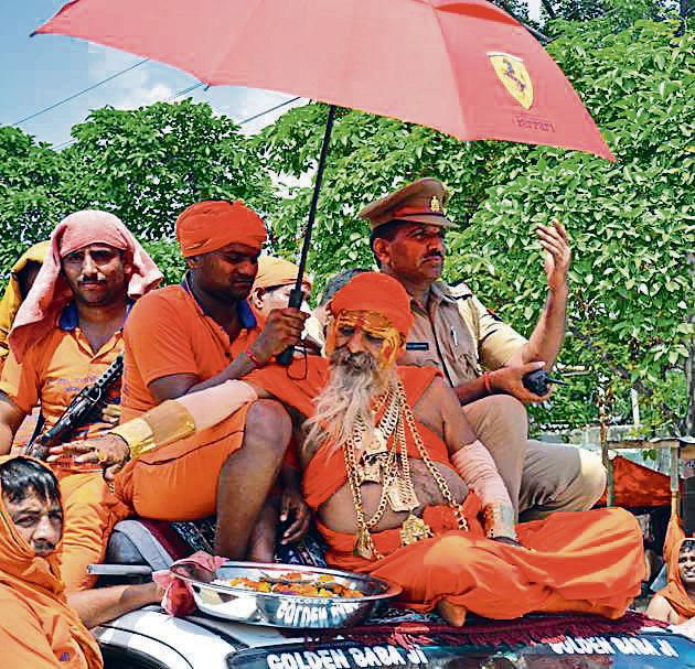 Kanwar yatra Golden Baba is back with 2kg more gold a rolex