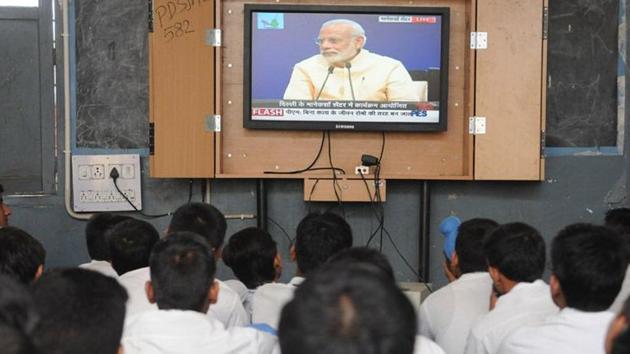 Students listening to Prime Minister Narendra Modi's 'Mann Ki Baat' programme at Government Senior Secondary School, Ladowali.(HT File Photo)