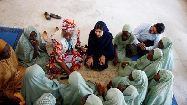 Nobel laureate Malala Yousafzai in a group discussion with some of the students of Yerwa Girls school in Maiduguri, Nigeria on Tuesday. (Reuters Photo) Nobel laureate Malala Yousafzai in a group discussion with some of the students of Yerwa Girls school in Maiduguri, Nigeria on Tuesday. (Reuters Photo)