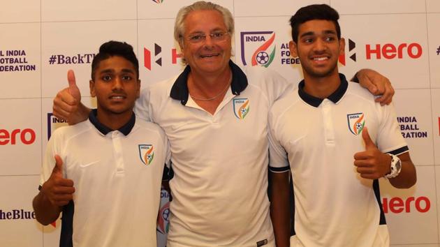 India U-17 football team coach Luis Norton de Matos with footballers Shubham Sarangi (R) and Rahul BK (L).(AIFF)