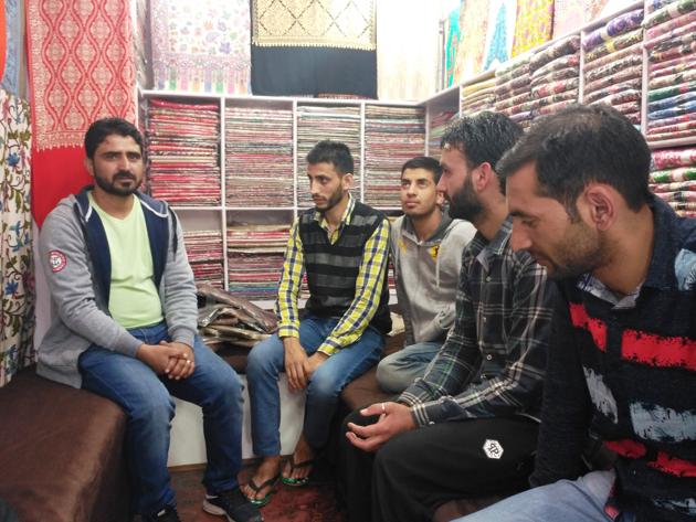 Mohammad Shafi Khan (extreme left) with his cousins at his shop in Mussoorie.(Anupam Trivedi / HT Photo.)