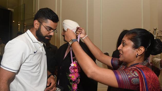 Virat Kohli, India captain, is given a traditional welcome as he arrives with teammates at a hotel in Colombo. His first overseas Test series win as captain came in Sri Lanka. (AFP) Virat Kohli, India captain, is given a traditional welcome as he arrives with teammates at a hotel in Colombo. His first overseas Test series win as captain came in Sri Lanka. (AFP)
