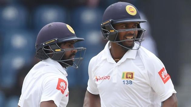 Asela Gunaratne (R) and Niroshan Dickwella run between the wickets during the final day of a one-off Test match between Sri Lanka and Zimbabwe. (AFP) Asela Gunaratne (R) and Niroshan Dickwella run between the wickets during the final day of a one-off Test match between Sri Lanka and Zimbabwe. (AFP)