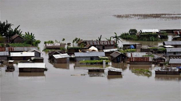 The Brahmaputra was flowing above the danger level at Dibrugarh, Nimatighat, Tezpur, Goalpara and Dhubri on Sunday.((PTI Photo))