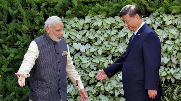 Indian Prime Minister Narendra Modi and Chinese President Xi Jinping during the BRICS Summit in Goa in October 2016(Reuters)