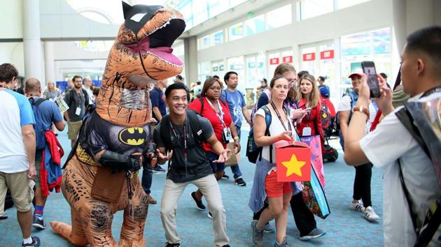 Attendees roam the halls at the San Diego Convention Center during Comic Con International. (Sandy Huffaker / AFP)