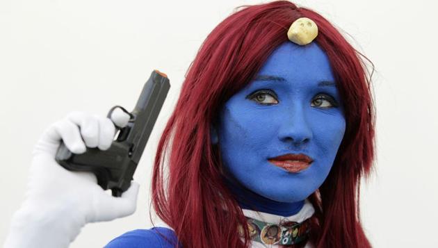 Michelle Hoffman of Wisconsin, plays the part of Mystique from the X-Men movie. (Bill Wechter / AFP)