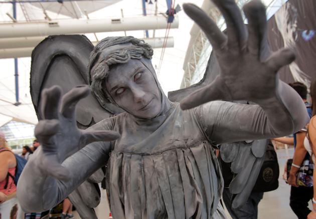 Christina Silvoso plays the part of the Weeping Angel from the TV show Dr. Who during Comic-Con 2017 in San Diego, California. More than 100,000 fans have descended on San Diego in California . Comic Con International is North America's largest Comic convention featuring pop culture and entertainment elements across virtually all genres, including horror, animation, manga, toys, collectible card games, video games, webcomics, and fantasy novels as well as movie premieres and actor panels (Bill Wechter / AFP)